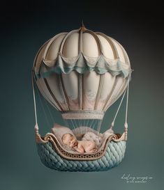 a baby is sleeping in a hot air balloon