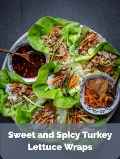 sweet and spicy turkey lettuce wraps on a platter with dipping sauces