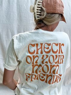 Discover the perfect way to keep the mom vibe alive and spreading positivity with our "Check On Your Mom Friends" Graphic T-shirt. Crafted with love and attention to detail, this t-shirt isn't just a piece of clothing; it's a message, a reminder to everyone to keep the sisterhood of motherhood strong and supported. Printed on a high-quality Comfort Colors t-shirt, it promises not only a meaningful message but also unbeatable comfort and durability. This Mom Graphic T-shirt, featuring a groovy fo Postpartum Clothes, Friends Graphic, Post Partum Outfits, Mom Friends, Mom Outfit, New Mom Gift, Friends Mom, Positive Affirmation, Your Mom