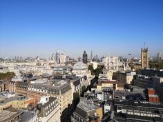 an aerial view of the city with tall buildings