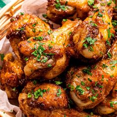 a basket filled with lots of fried food