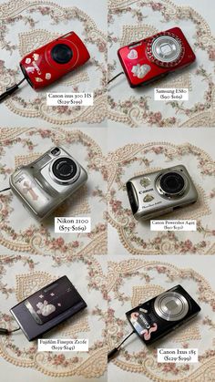 several different types of digital cameras sitting on top of a white table with floral designs