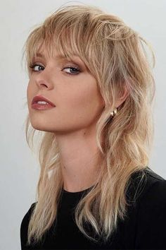 25 Trendy Aesthetic Shaggy Haircuts for Women: Your Ultimate Style Guide | The Best Stylish 25 Shaggy Haircuts for Women (Detailed Gallery) Midlength Shag Mullet, Grunge Shag Haircut Medium, Mullet In A Ponytail, Miley Mullet, Edgy Shag Haircut With Bangs, Wolf Cut With Micro Bangs, 80s Shag Haircut, Mullet Long Hair