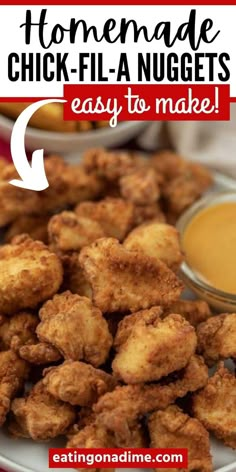 fried chicken nuggets on a white plate with dipping sauce in the background and text overlay that reads homemade chick - fila nuggies easy to make