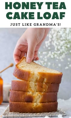 a person holding a piece of bread with honey tea cake loaf in front of it