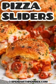 pizza sliders with melted cheese and marinara sauce