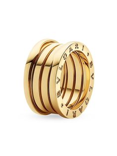 Find BVLGARI B. Zero1 18k 4-band Ring on Editorialist. From the B.zero1 Collection. Beguiling in its four-ring design, this bold piece is constructed with luxurious gold. 18K yellow gold Made in Italy ABOUT THE BRAND Founded in Italy in 1884 by Greek silversmith Sotirio Bulgari, BVLGARI has become synonymous with unparalleled craftsmanship and exquisite jewelry. The brand's Roman heritage can be seen in pieces inspired by the city's architecture, artwork and ancient mosaics. Today, the house continues to translate its rich history into opulent designs and fragrances. BVLGARI. Size: 7. Bulgari Ring, Mother Of Pearl Rose, Bvlgari Necklace, Bulgari Jewelry, Diana Vreeland, Sparkle Jewelry, Gold Gold