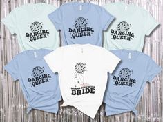 four t - shirts with the words dancing queen on them in black, white and blue