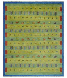 a green rug with animals and trees on the front in blue, red, and yellow