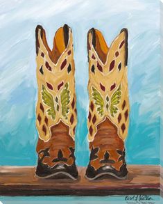 a painting of a pair of cowboy boots sitting on a ledge with blue sky in the background