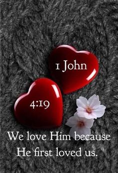 two hearts with the words, we love him because he first loved us