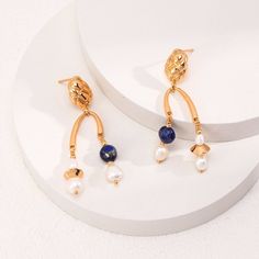 Introducing our charming pair of earrings, crafted with sterling silver and embellished with natural freshwater pearls and lapis lazuli. Inspired by romantic classical design, these earrings feature a vintage gold tone complemented by hues reminiscent of an oil painting. With asymmetric sizing and delicate balance, they exude an artistic flair, embodied in the trendy pearl cluster structure. Embrace the timeless elegance and artistic expression of our earrings, perfect for adding a touch of soph Dainty Pearl Earrings, Vintage Jewelry Antique, Trending Jewelry, Pearl Cluster, Women Birthday, Mother Birthday Gifts, Friends Fashion, Trendy Jewelry, Style Gift