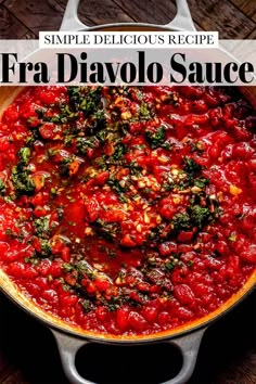 a skillet filled with sauce on top of a wooden table and text overlay reads simple delicious recipe fra diavolo sauce