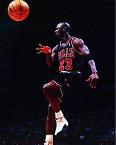 an image of a basketball player jumping in the air