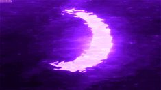 an image of the moon taken from space in purple and black colors, with light reflecting off it's side