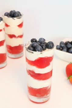 red, white and blue desserts with strawberries in them