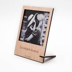 a wooden photo frame with the words la merior mama on it and a woman's face