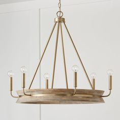 a chandelier with six lights hanging from it