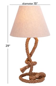 a lamp that is made out of rope and has a white shade on the top