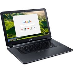 an open laptop computer sitting on top of a white surface with the google logo above it