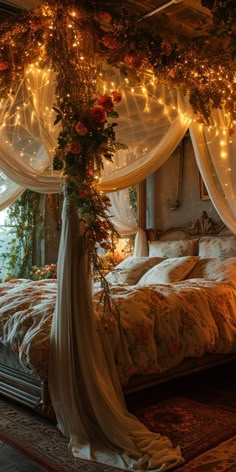 a canopy bed decorated with lights and flowers