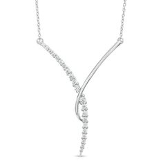 Bring sleek sophistication to any look with this marvelous diamond "Y" necklace. Fashioned in cool 10K white gold, this stylish choice showcases a polished curved ribbon overlapping a sparkling curved row of diamonds in a chic "Y" shape. Radiant with 1/3 ct. t.w. of diamonds and a brilliant buffed luster, this design suspends centered along an 18.0-inch cable chain, with an additional closure ring at 16.0 inches, that secures with a lobster claw clasp. Modern Mangalsutra, Silver Diamond Necklace, Diamond Anniversary Bands, Pearls Jewelry, Y Necklace, Bridal Look, Diamond Anniversary, Anniversary Bands, Diamond Band