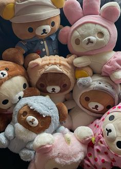 a group of stuffed animals sitting next to each other