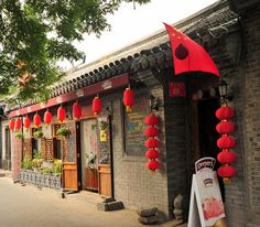 The Bar Street of Southern Gong and Drum Lane: The Bar Street of the Southern Gong and Drum Lane has distinctive features. The bars have traditional decorations. The bars here aren’t generally noisy or rough. It is a hangout for young people. Many bars have WiFi internet service. Bar Street, Wifi Internet, The Bar, Wind Chimes, Drums, Internet, Bar