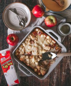 an apple cobbler is shown with apples and milk