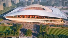 an aerial view of a large building in the city