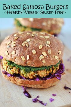 a close up of a sandwich on a cutting board with the words baked samosa burgers healthy vegan - gluten free