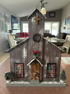 a small wooden church with stained glass windows