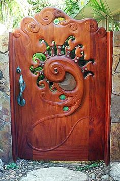 a wooden door with an intricate design on it