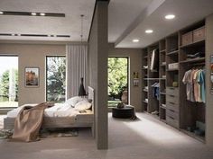 a bedroom with an open closet and bed