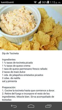 a bowl of chips and dip on a plate with the recipe in spanish above it