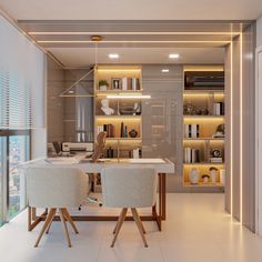 two white chairs sitting at a table in front of a bookshelf