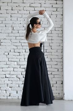 Extravagant two length black maxi skirt - METSk0004  A gorgeous black skirt is always welcome in anyone’s wardrobe. The silhouette of this piece is created with the idea of a fashionable and yet comfortable look that a 21 century woman should have. I have chosen a modern shape of a shorter front side and a classic long back, making the skirt very elegant and super practical at the same time. The beauty of this piece is that it can be worn in many occasions and by everyone no matter what age y... Black Full Skirt Maxi Dress For Spring, Spring Black Maxi Dress With Full Skirt, Spring Black Full Skirt Maxi Dress, Black Maxi Dress With Full Skirt For Evening, Black Full Maxi Skirt For Evening, Chic Black Maxi Length Bottoms, Chic Black Maxi Bottoms, Fitted Black Maxi Dress With Full Skirt, Fitted Black Maxi Dress With Lined Skirt