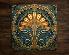 an intricately designed piece of art on a wooden surface with gold and blue accents