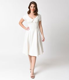 Vintage Inspired Wedding Dresses Unique Vintage 1940s Style Ivory Knit Short Sleeve Natalie Swing Dress $78.00 AT vintagedancer.com 1940s Inspired Dress, Vintage Retro Outfits, Retro Wedding Dresses, White A Line Dress, Vintage Inspired Wedding Dresses, Dresses Unique, 1940s Style, Affordable Wedding Dresses, Pin Up Dresses