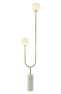 two white and gold lamps on a white background with one light turned off to the side