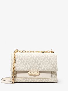 One bag, many occasions: the Signature-print Cece defines everyday sophistication. Designed in a fold-over silhouette with gleaming hardware and a lock-and-key detail, it’s generously sized to hold all your daily essentials. Reach for it to top off any look with polish. White Rectangular Bag With Turn-lock Closure, White Travel Bags With Turn-lock Closure, Valentines Day Presents, Michael Kors Outlet, Michael Kors Shoulder Bag, Media Logo, Bags Logo, Shoulder Bag Black, Signature Print