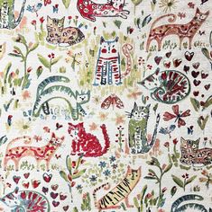 an animal and floral pattern on fabric with hearts, flowers, and other things in the background