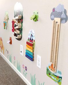 there are many toys on the wall in this children's room