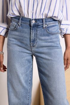 A cropped wide leg creates the chic silhouette of these 7 For All Mankind jeans. Perfect for day-to-night wear, the Alexa features raw ankle-length hems and soft stretch denim fabric in a faded blue wash. | 7 FOR ALL MANKIND Women's Cropped Alexa w Raw Hem Jeans, Size 27, Blue Stretch Denim Fabric, Raw Hem Jeans, Hem Jeans, Fashion 101, Night Wear, 7 For All Mankind Jeans, Fall Shopping, Tee Dress, Work Fashion