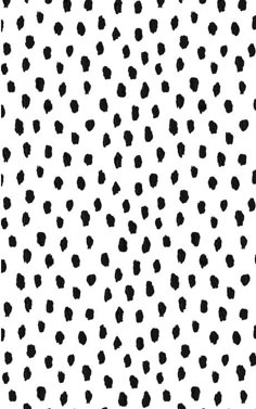 an abstract black and white background with small dots