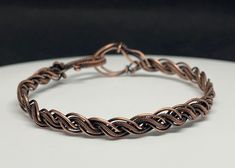 Braided Coiled and Bare Copper Bracelet. 7" long. This bracelet has been antiqued, polished and sealed. Sealed with Protectaclear. ProtectaClear is a clear, protective coating that is tough enough to protect jewelry and is safe for wear against skin. ProtectaClear is practically invisible once applied and will seal and protect jewelry from tarnish, oxidation, and corrosion. Sunstone Bracelet, Wire Wrap Jewelry Designs, Diy Braids, Copper Cuff Bracelet, Labradorite Bracelet, Copper Cuff, Wrap Jewelry, Moonstone Bracelet, Argentium Silver