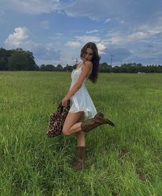 Picking Flowers Outfit, Country Outfits Women Aesthetic, Cute Country Instagram Pictures, Spring Outfits Cowboy Boots, White Dress With Brown Cowboy Boots, Dress And Brown Cowboy Boots Outfit, Rainy Walk Outfit, Latina Cowgirl Outfits Dress, Cowboy Boot With Dress