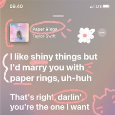 a text message from paper rings author taylor swift on her phone screen, with the caption'i like shiny things but i'd marry you with paper rings, uh - uh - huh - hues, that's right darlin '