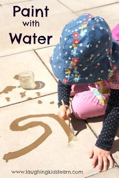 Paint with water activity for kids who are bored or wanting to be creative outdoors. It's a wonderful science activity for younger children to learn about evaporation in a fun and creative way. Watch children of all ages explore the use of water on outdoor play surfaces. Great for babies, kindergarten or prek children. Another enjoyable way to get children outdoors and playing in the sunchine. Pom Pom Drop, Painting With Water, Activity For Toddlers, Dandelion Wishes, Fun Outdoor Activities, Outdoor Activities For Kids, Toddler Play, Toddler Fun, Summer Activities For Kids