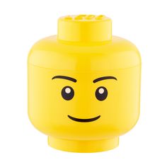 a yellow lego head is shown with eyes on it's face, and one eye has